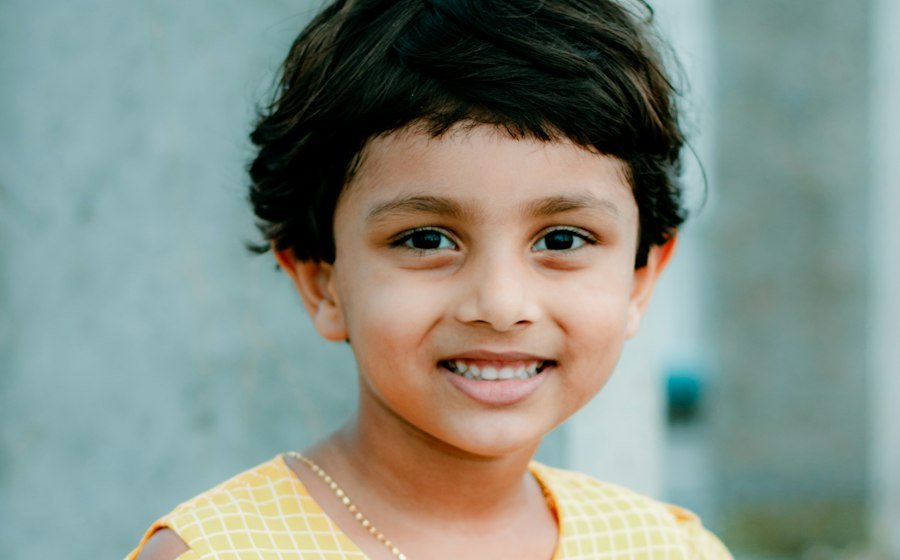 Sneha Varghese’s daughter smiling