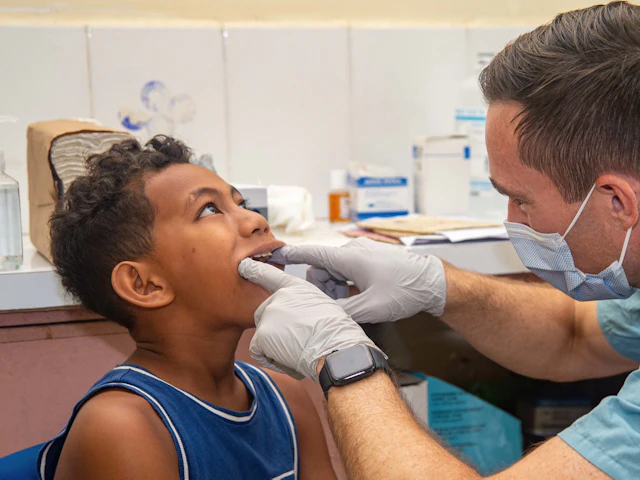 A young boy having a friendly dental check-up